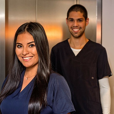 two smiling health care professionals